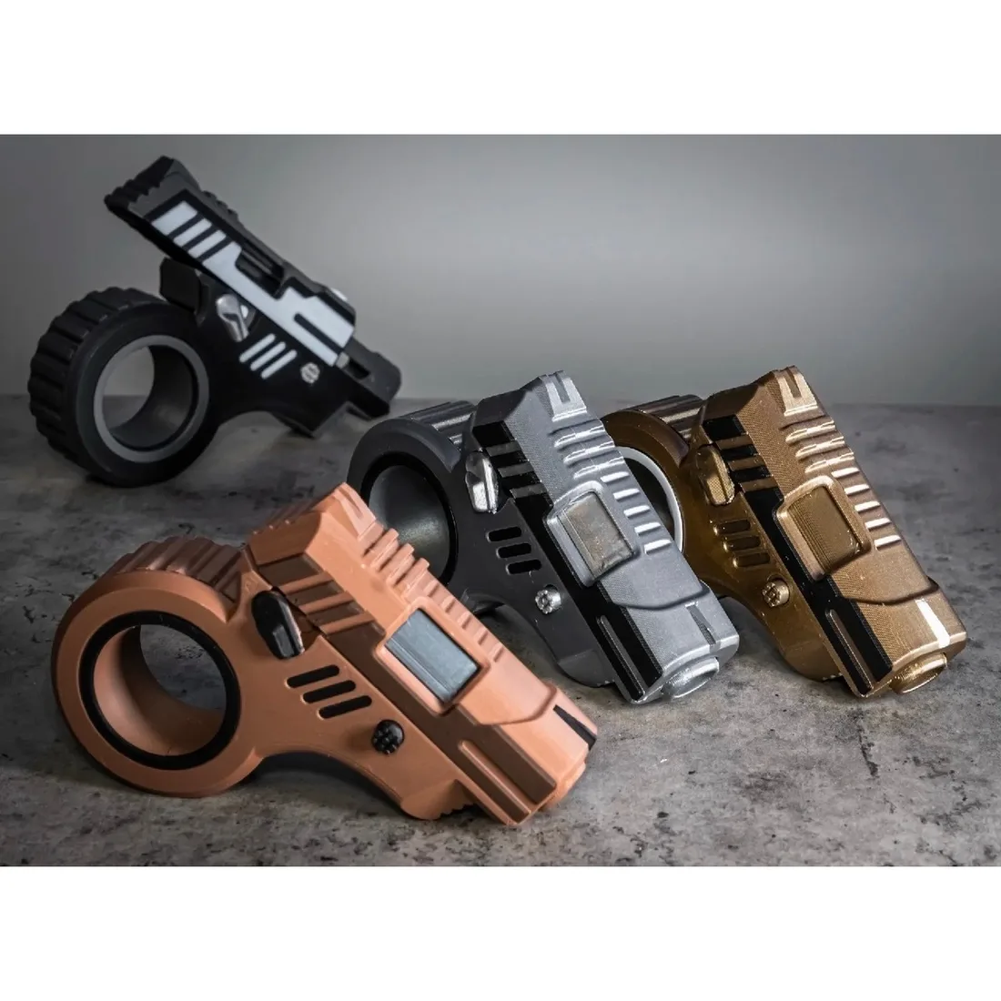 KEPA Fidget Gun — açılı stüdyo çekimi